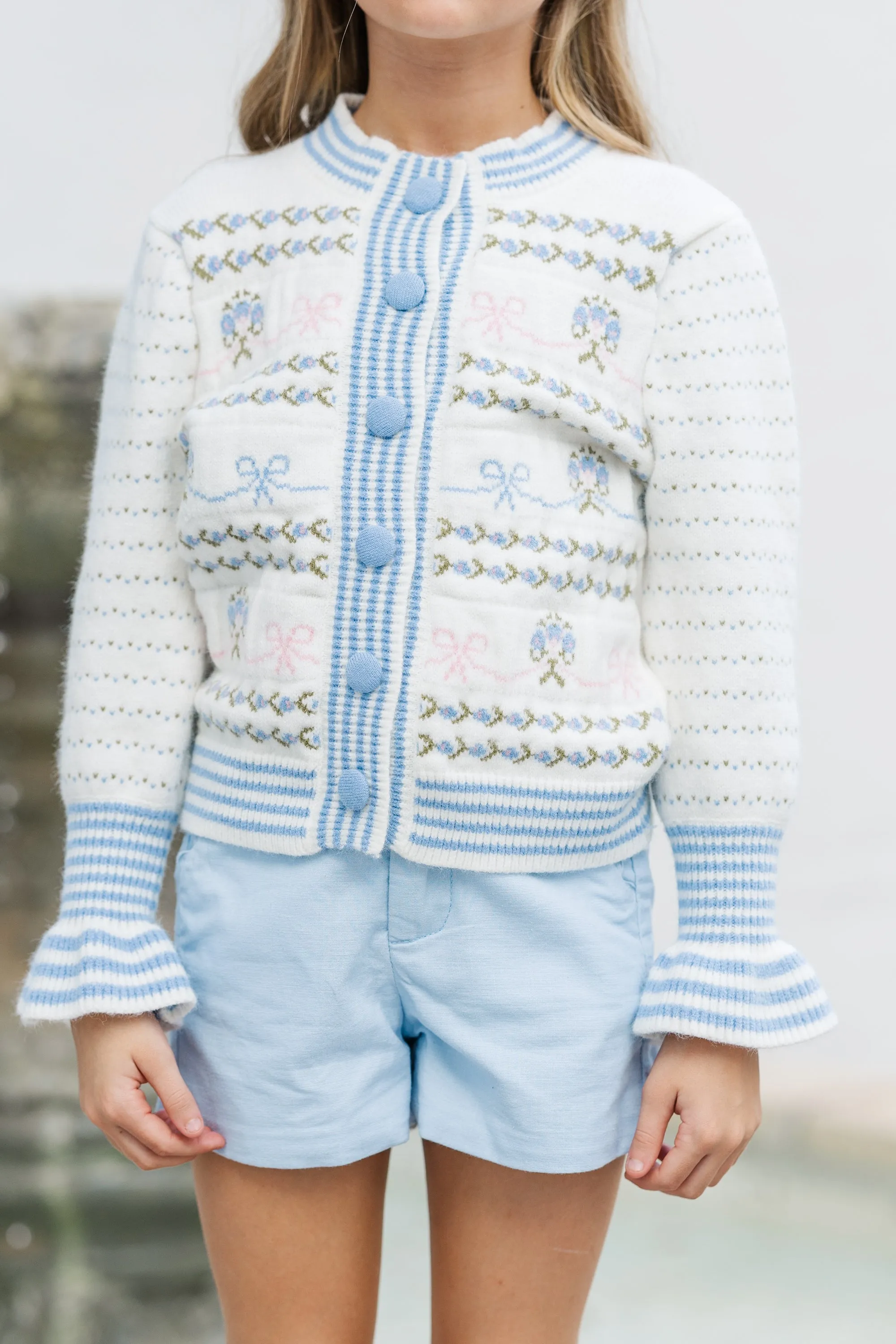 Girls: The Rhiannon Light Blue Bow Stitched Cardigan