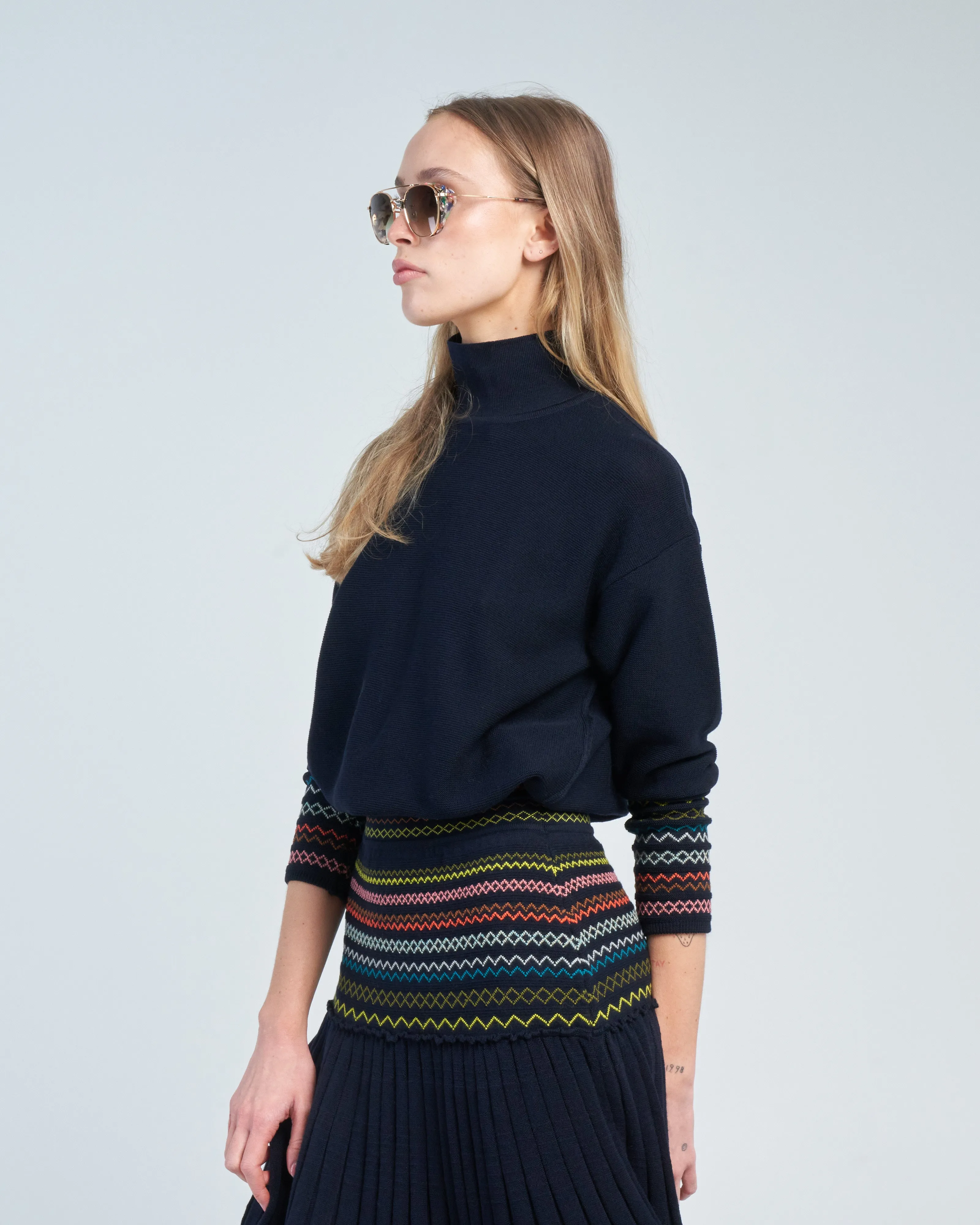 smocked high neck knit top