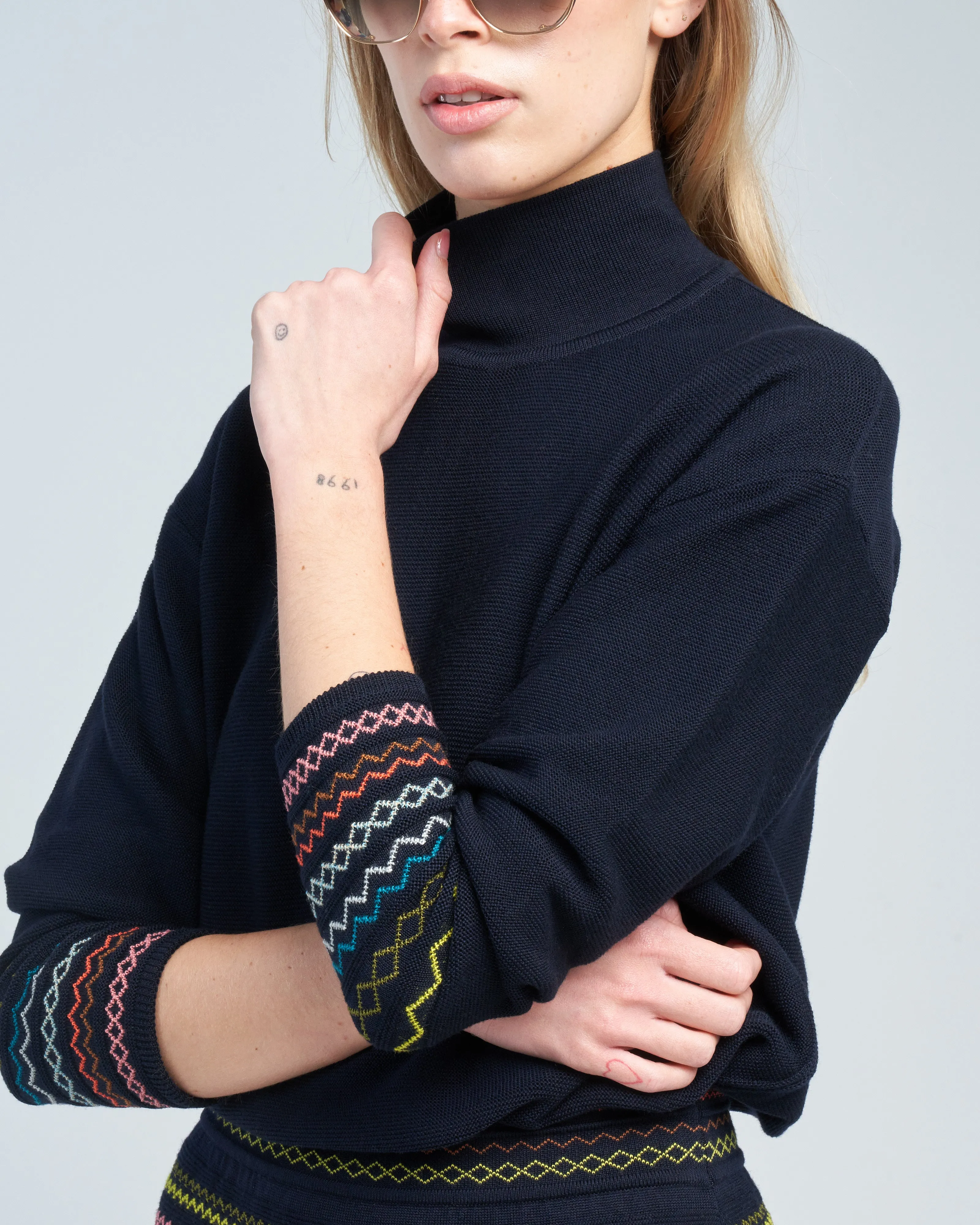 smocked high neck knit top