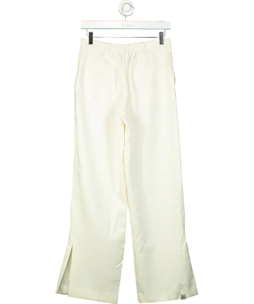 The Giving Movement Cream Wide-leg Smart Trouser UK S
